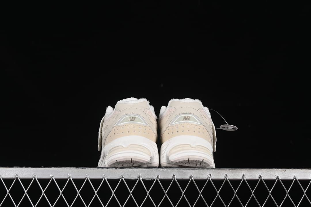 Rear view of the pair showing heel panels and soles