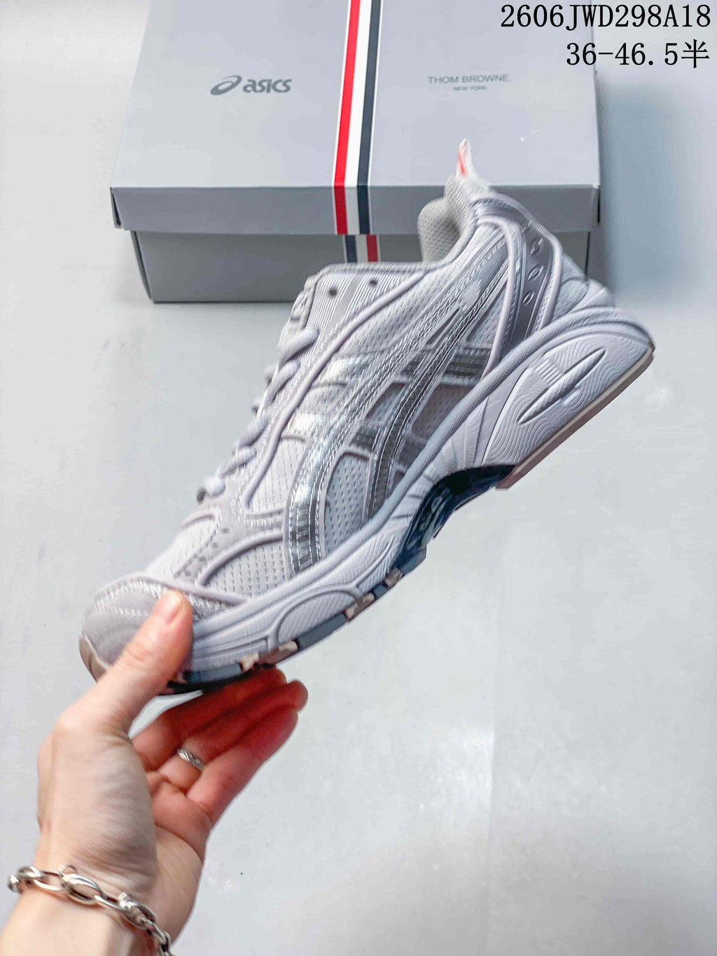 Side profile showing the layered upper and segmented sole.