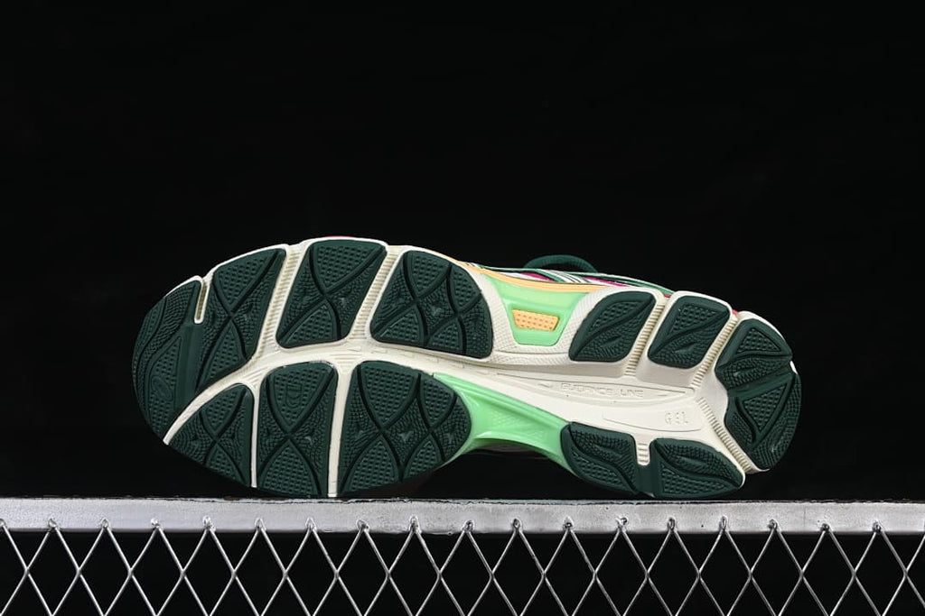 Underside view showing the patterned dark green outsole