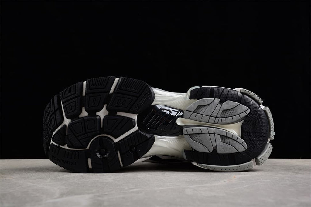Underside showing the segmented black and grey outsole