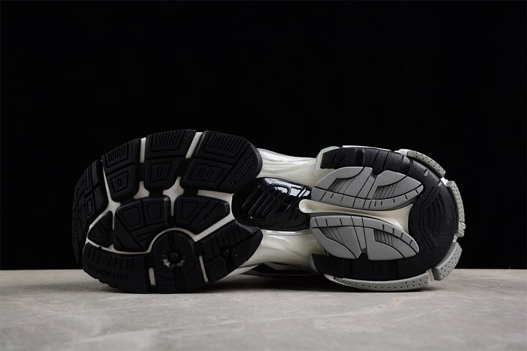 Underside showing the segmented black and grey outsole