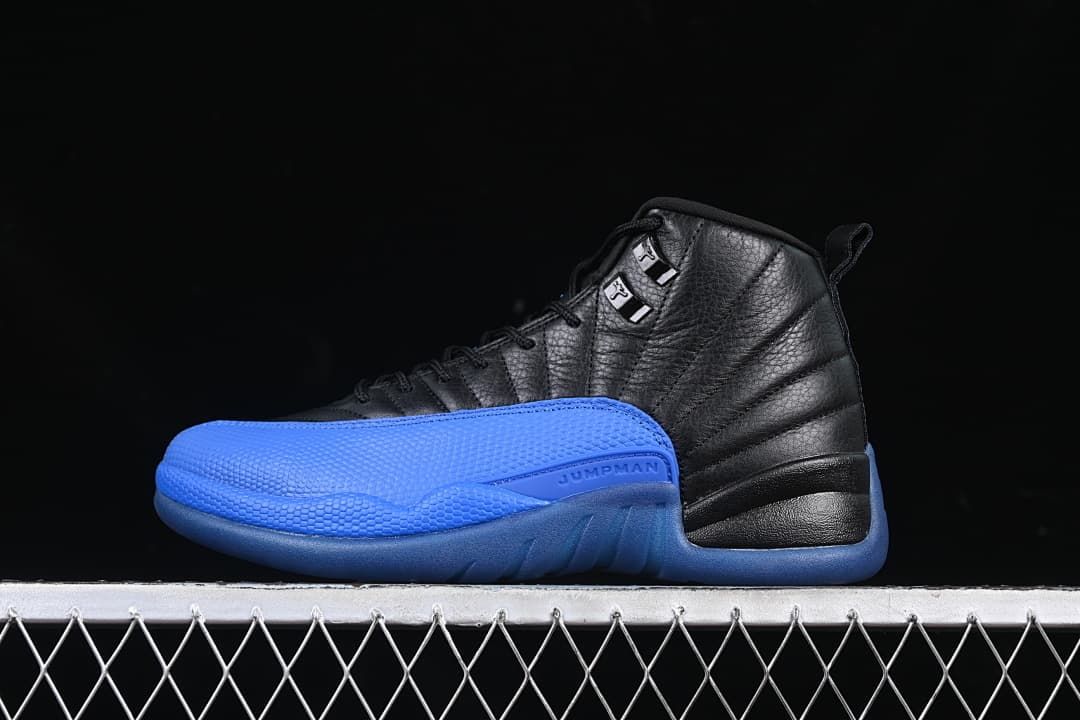 Side view of a black and blue Air Jordan 12 sneaker