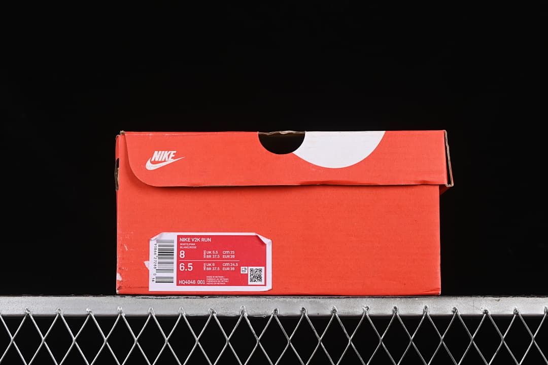 Nike shoe box with a label identifying the V2K Run and style code HQ4046-001.