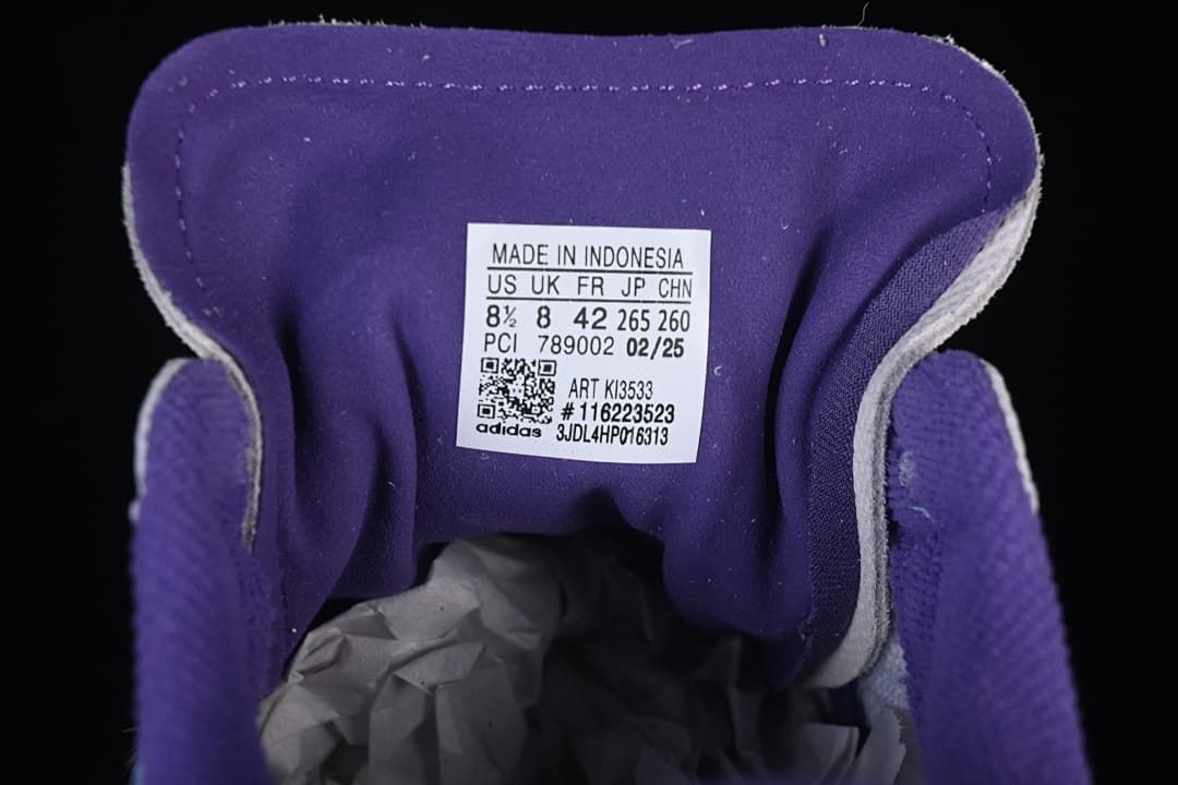 Shoe tongue label showing sample size EU 42 and style code KI3533