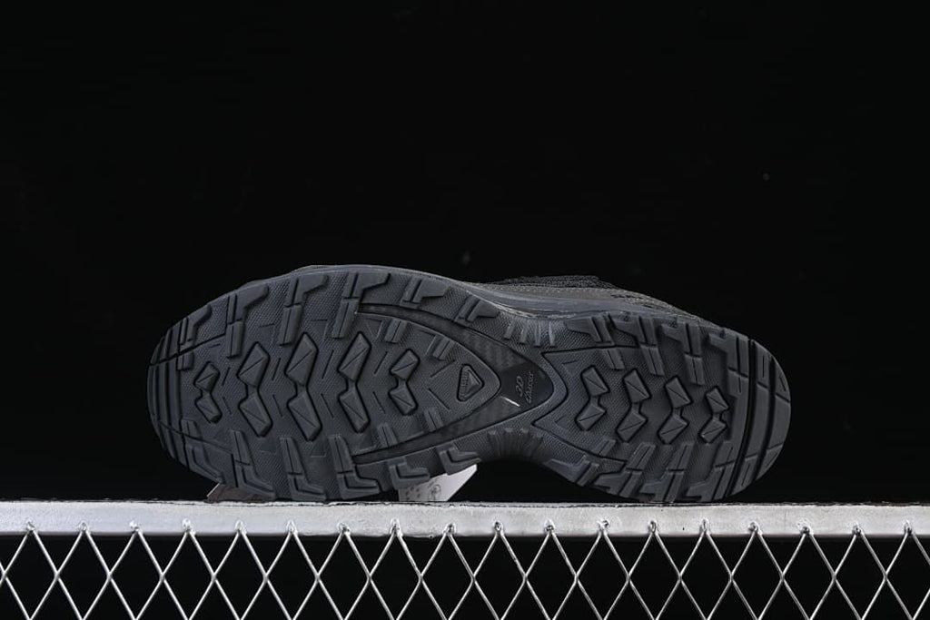 Underside view showing the lugged outsole tread