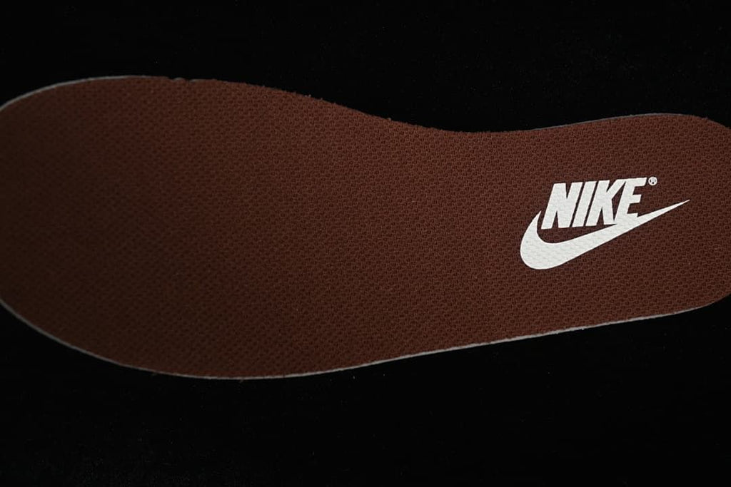 Close-up of brown insole with Nike branding