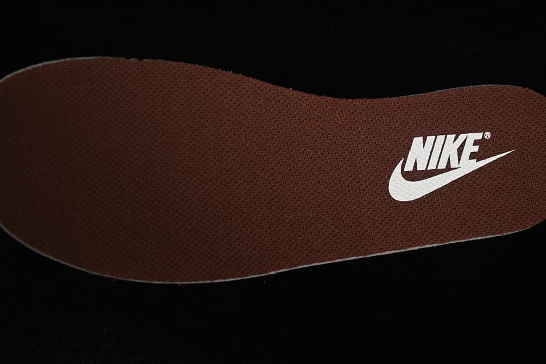 Close-up of brown insole with Nike branding