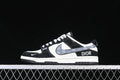 Side profile of black and white low-top sneakers with a gray patterned swoosh and contrasting branding.