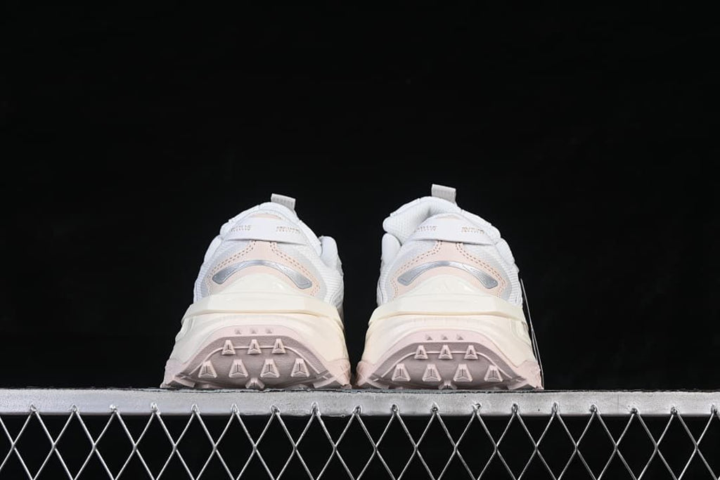 Rear view of the pair showing heel detailing and outsole tread