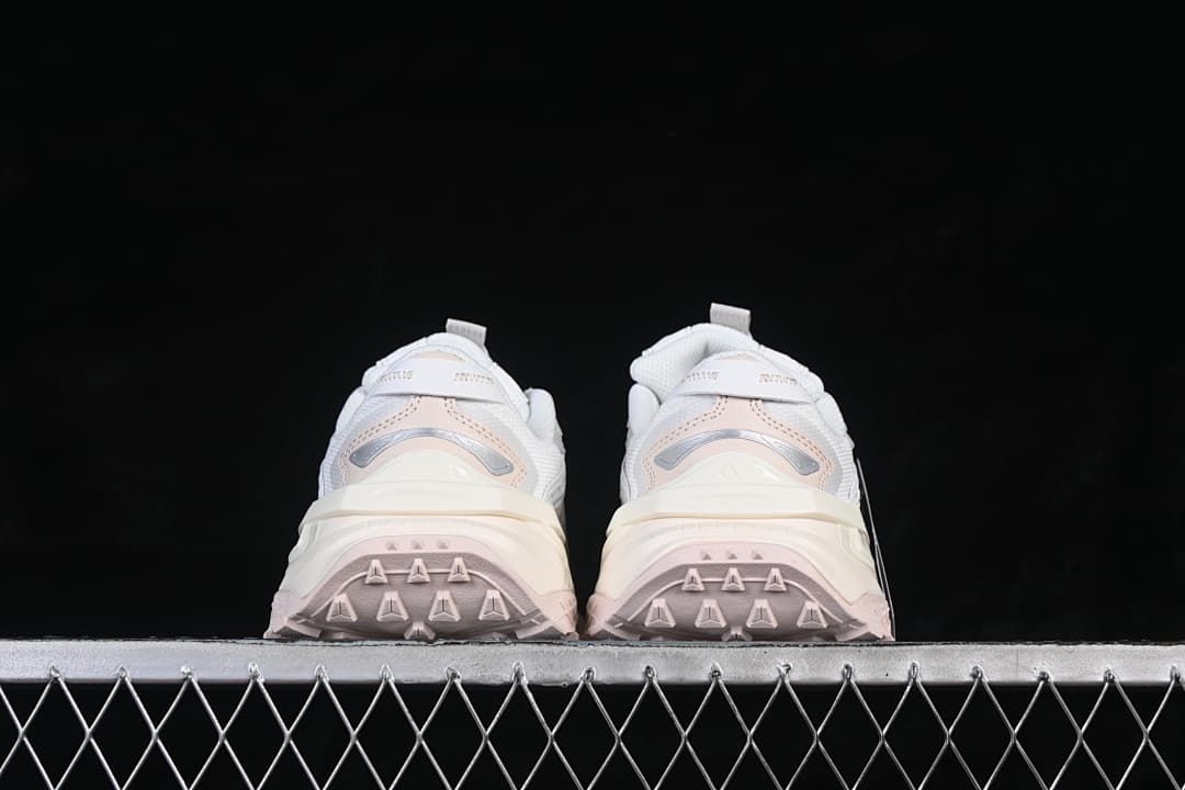 Rear view of the pair showing heel detailing and outsole tread