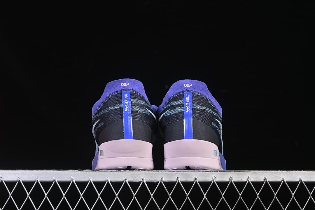 Rear view of the pair showing violet heel tabs and pale pink heel sections.