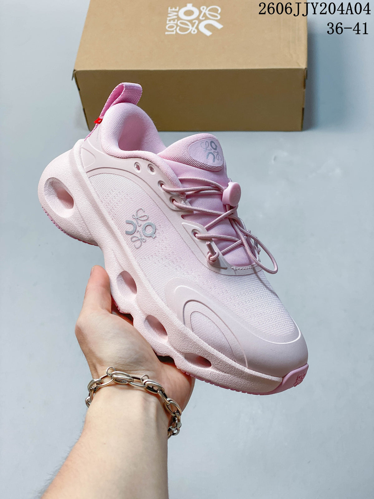 Pale pink On Cloudtilt sneaker with a sculpted sole and cord-style laces.