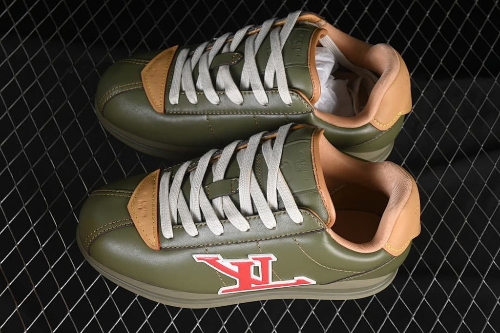 Pair of olive green low-top sneakers shown from above and side