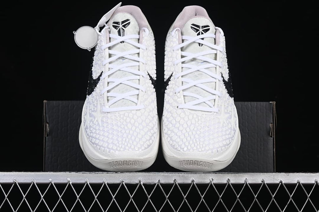 Front view of both shoes with patterned uppers and white laces
