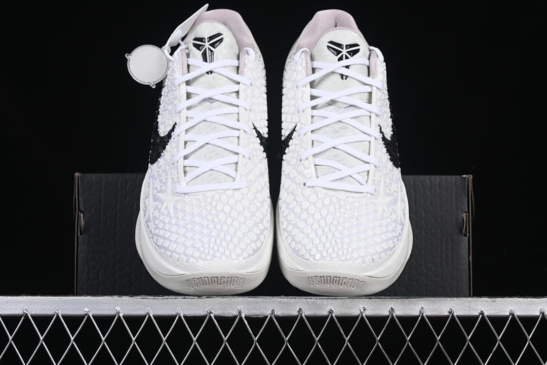 Front view of both shoes with patterned uppers and white laces