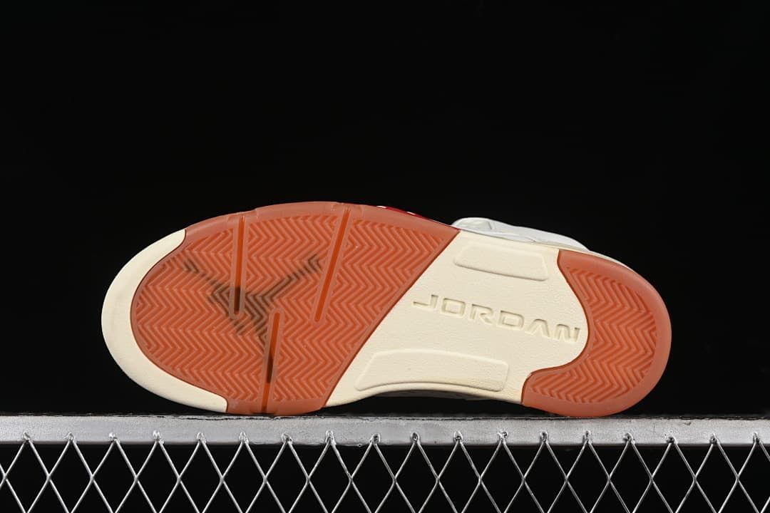 Underside showing the gum-colored outsole and Jordan branding