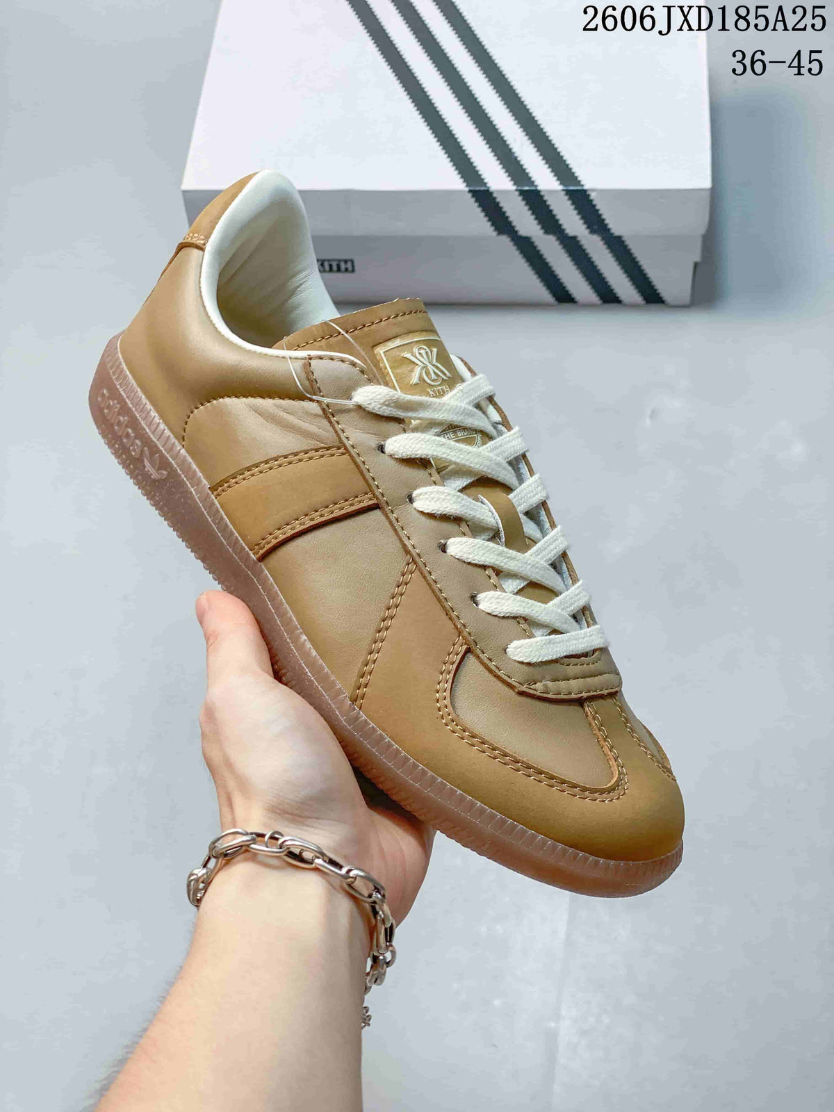 Side view of a tan adidas BW Army sneaker showing stitched panels and a gum-colored sole.