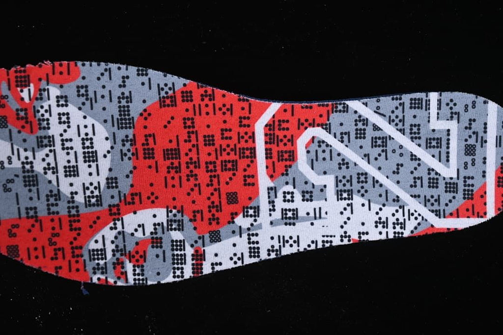 Printed red, gray, and black shoe insert