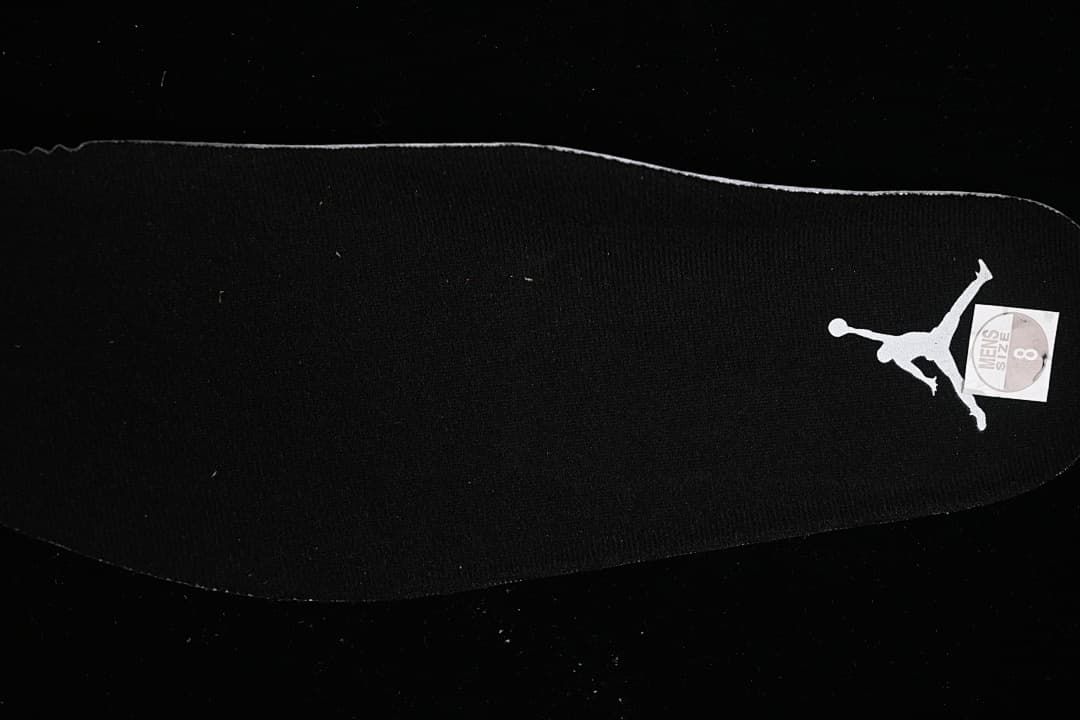 Black insole with Jumpman logo and size marking