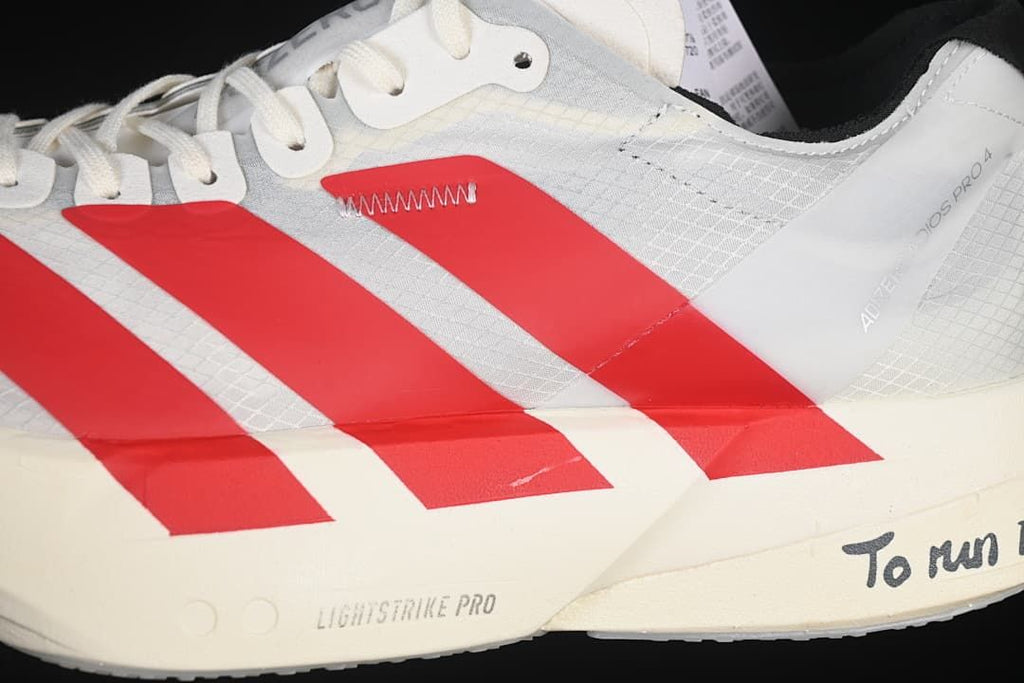 Close-up of the red side stripes and midsole markings