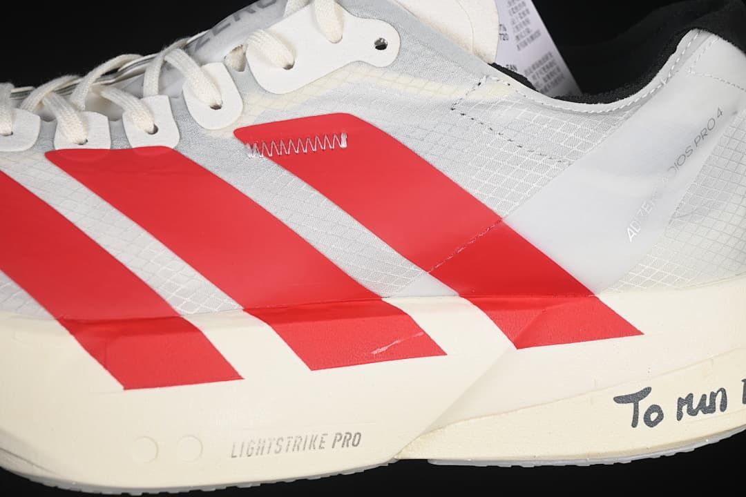 Close-up of the red side stripes and midsole markings