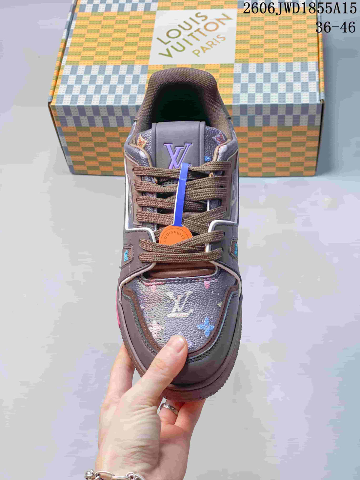 Top view of the sneaker showing brown laces and patterned toe and tongue panels.