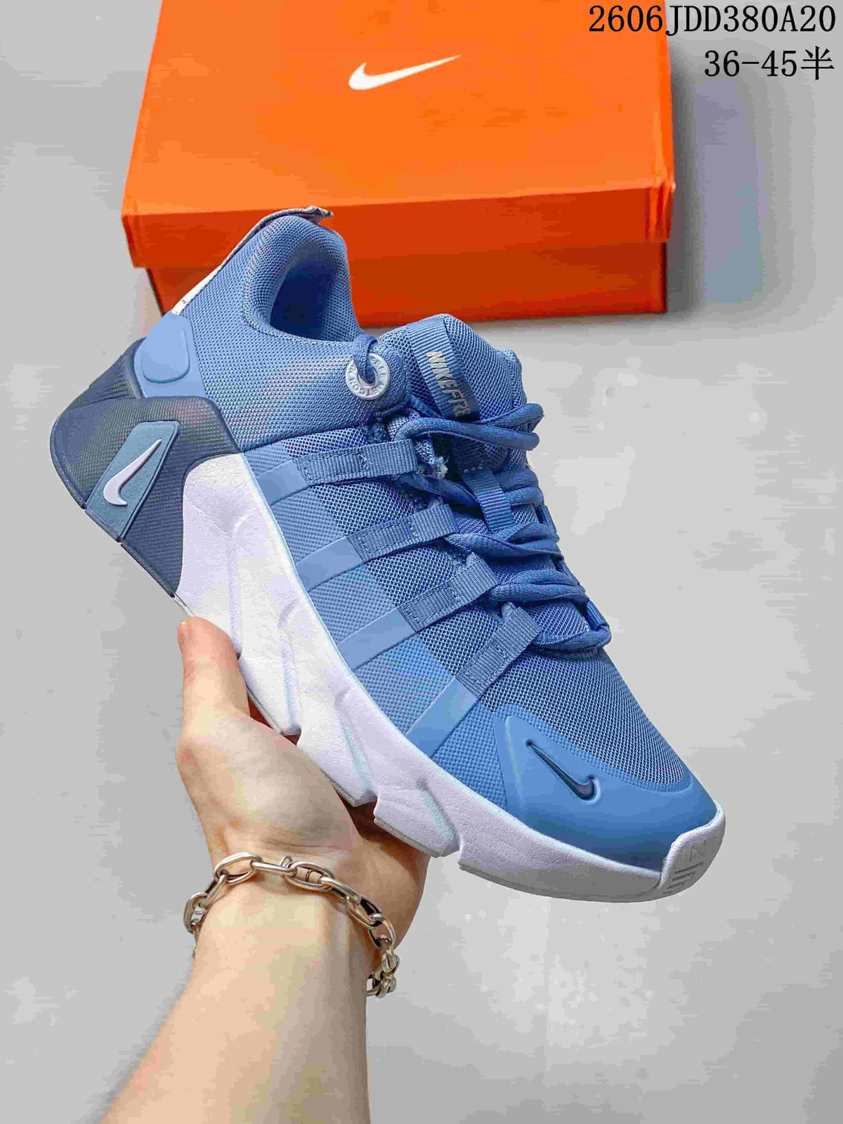 Blue Nike Free Metcon 7 shoe with a white sculpted sole