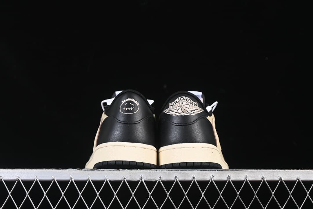 Rear view of both shoes with contrasting heel embroidery