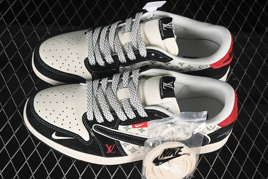 Top view of a pair of patterned low-top sneakers with patterned laces and an additional light-colored lace set