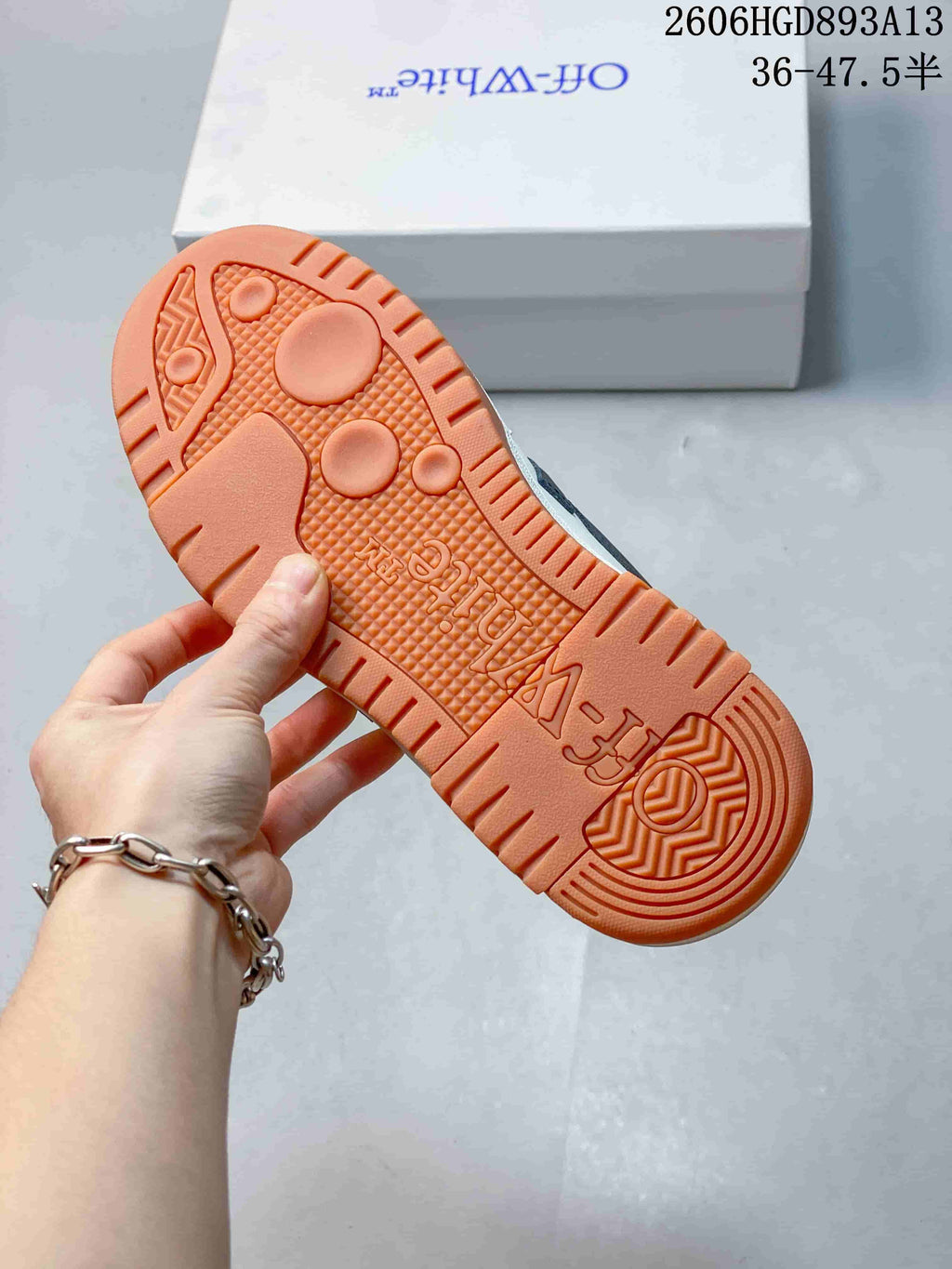 Close-up of the textured gum-colored outsole on the Out Of Office sneakers.