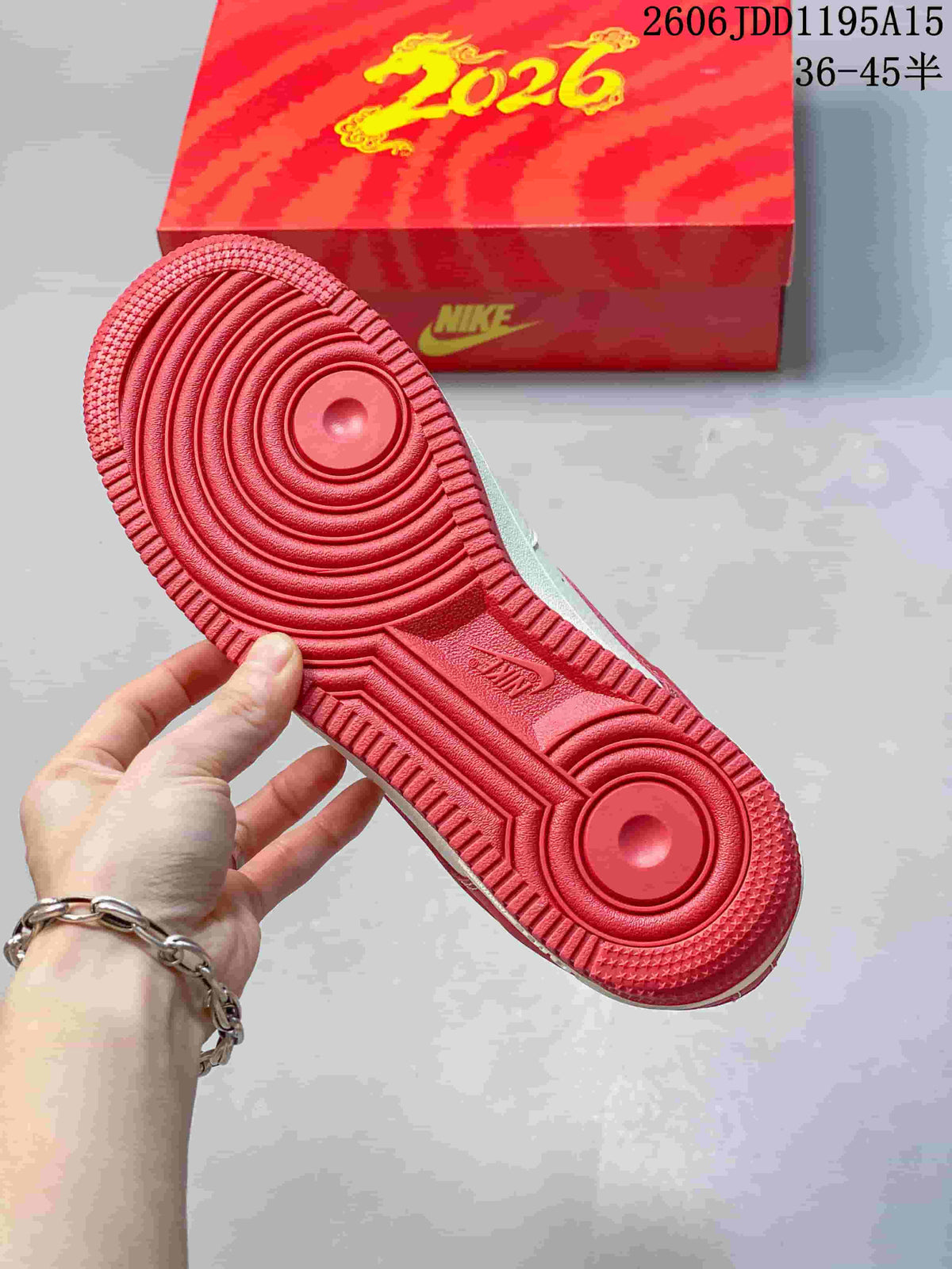 Close-up of the red outsole and red Year of the Horse shoe box