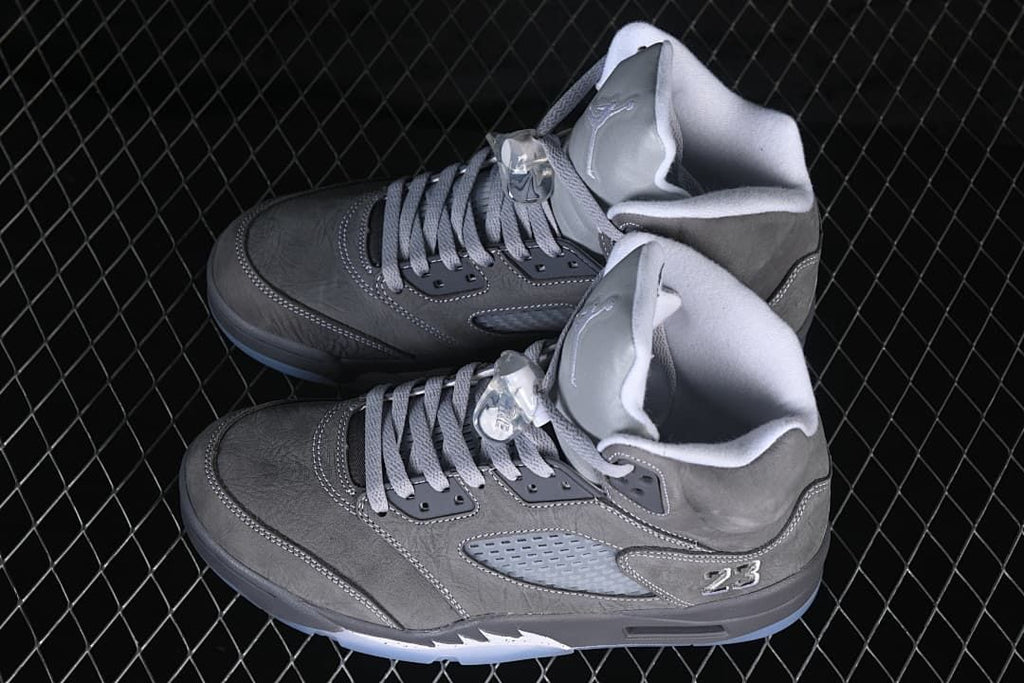 Pair of grey and white high-top sneakers