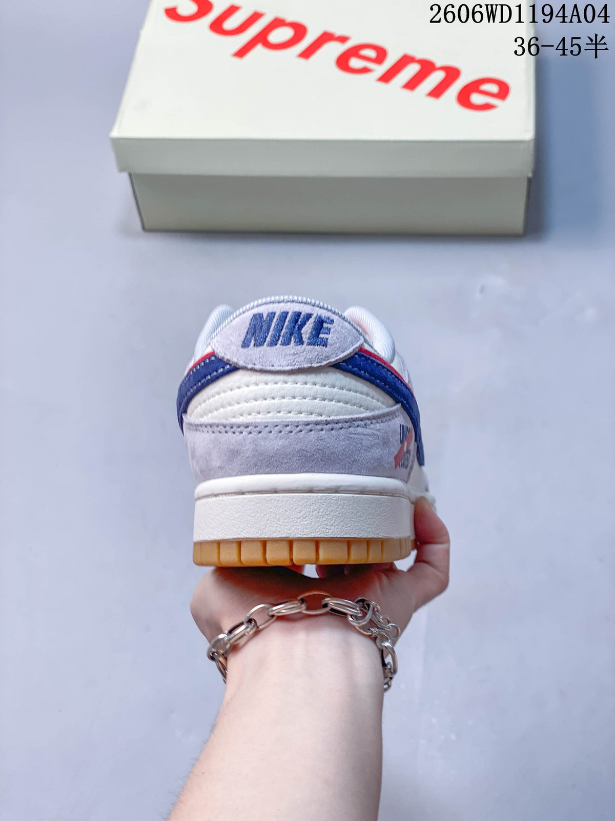 Rear view showing layered heel panels and gum-colored outsole