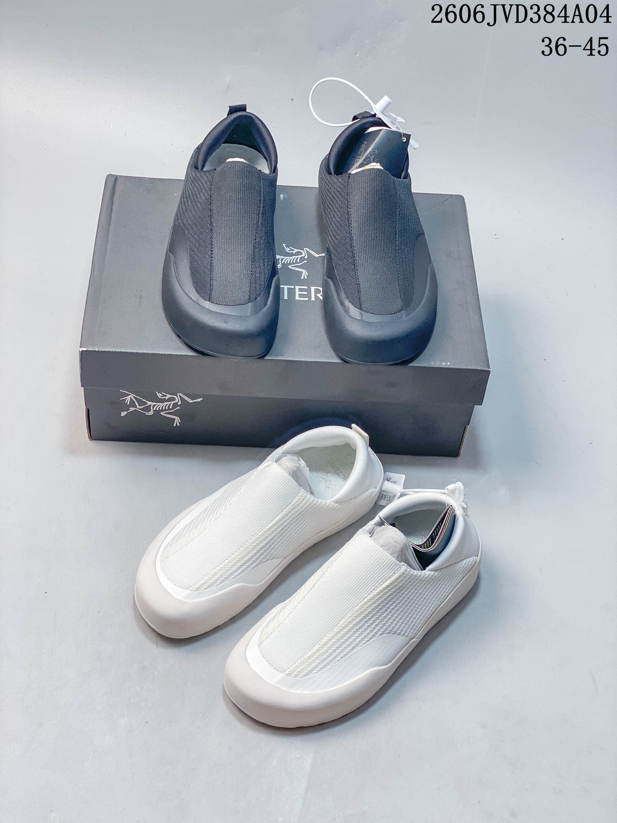 Dark charcoal and white pairs of slip-on shoes shown together; image label shows 36–45.