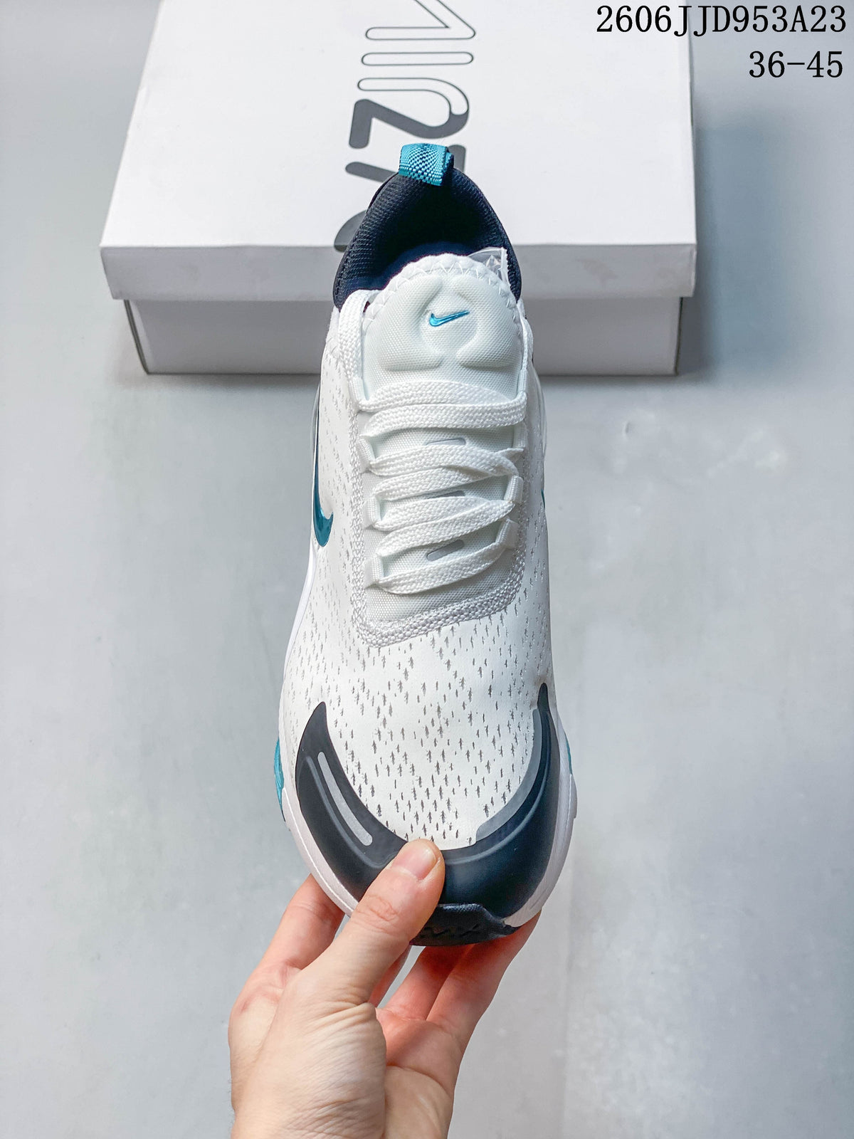 Front view showing the laces, perforated-looking upper, and dark toe accents.