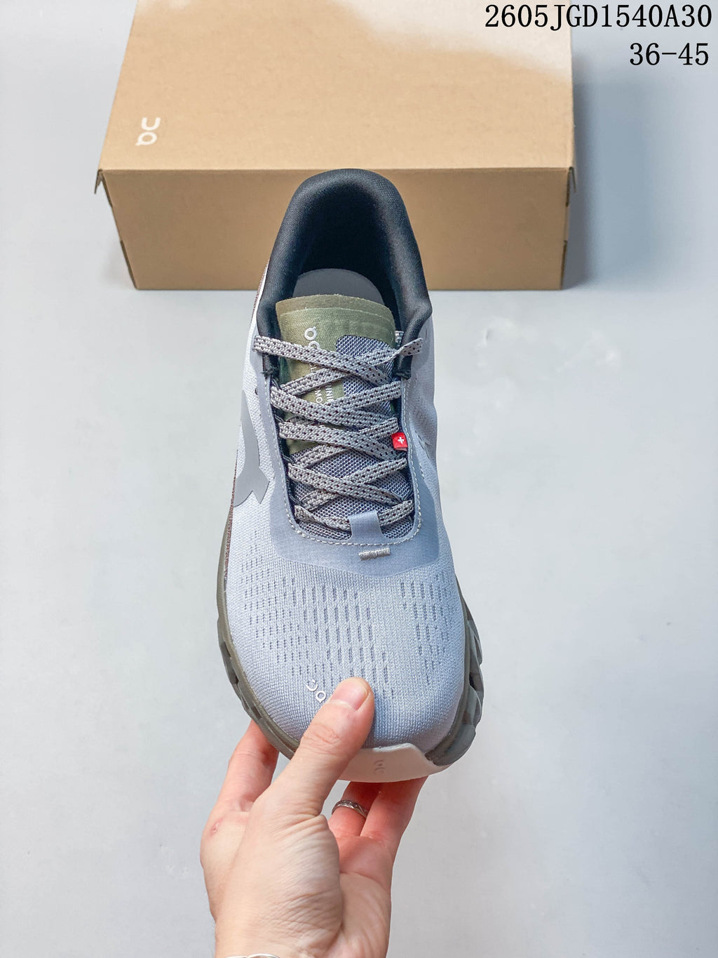 Top view of the sneaker showing its laces, tongue, and patterned upper