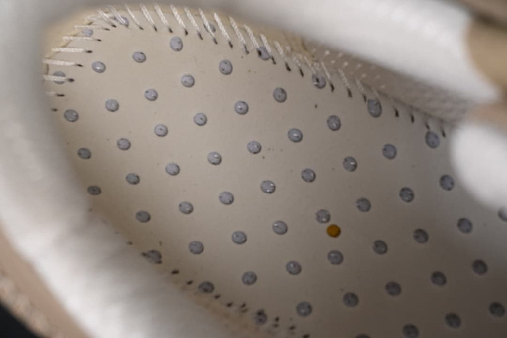 Detail of the dotted interior lining inside the sneaker