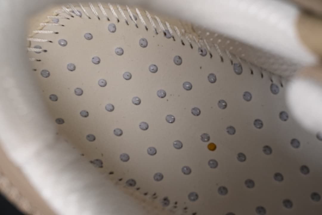 Detail of the dotted interior lining inside the sneaker