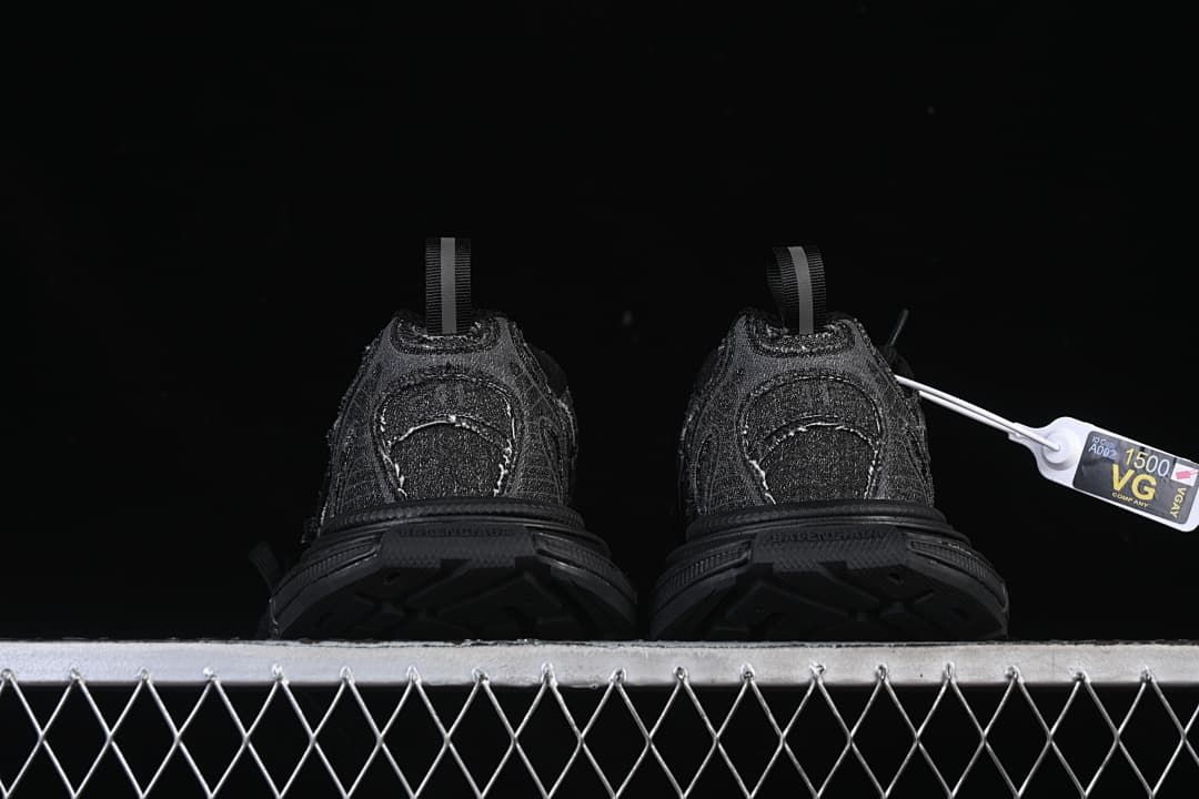Rear view of the sneakers showing heel details and pull tabs.