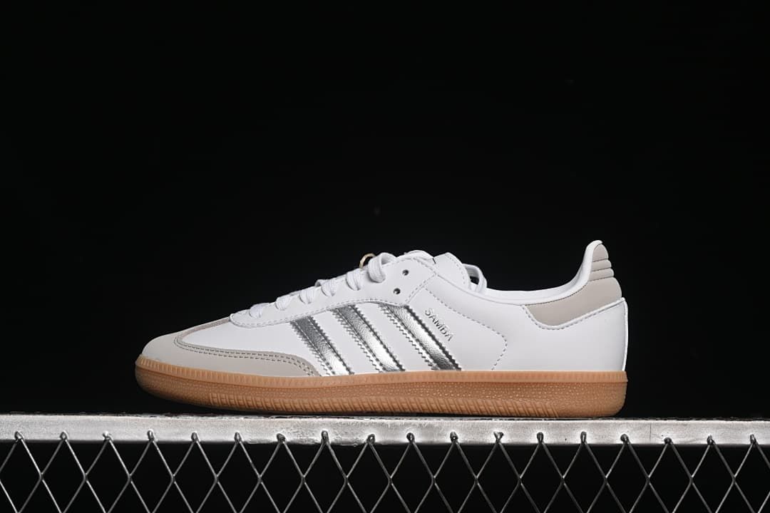 Side view of the Samba OG sneaker against a dark background