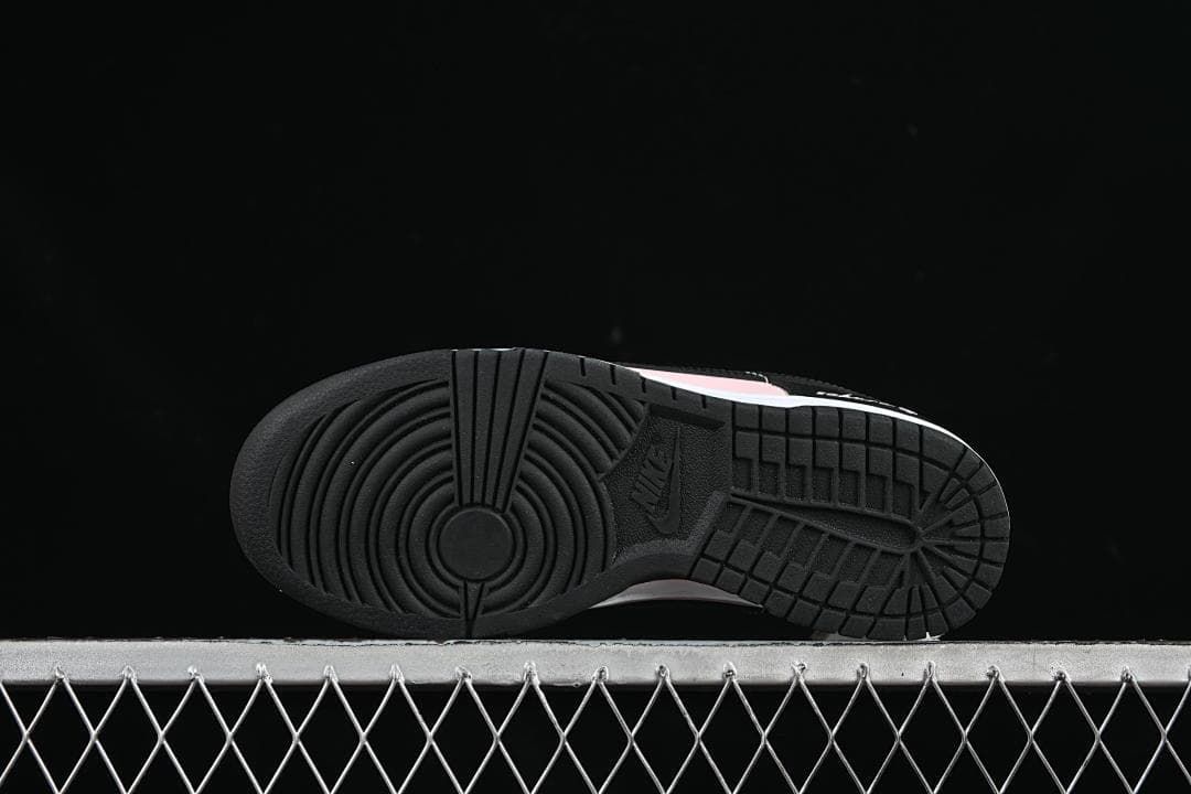 Underside view showing the black tread pattern