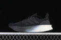 Side view of black Y-3 x adidas Ultraboost 5 sneakers with a contrasting light-colored heel section