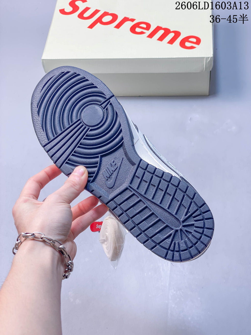 Close-up of the navy outsole and tread pattern