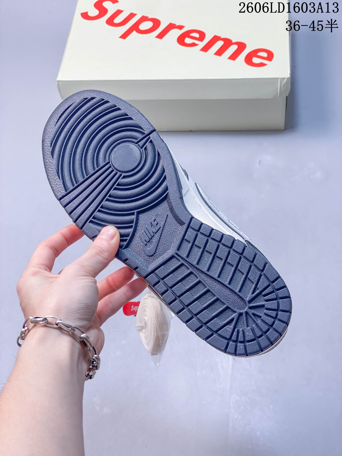 Close-up of the navy outsole and tread pattern