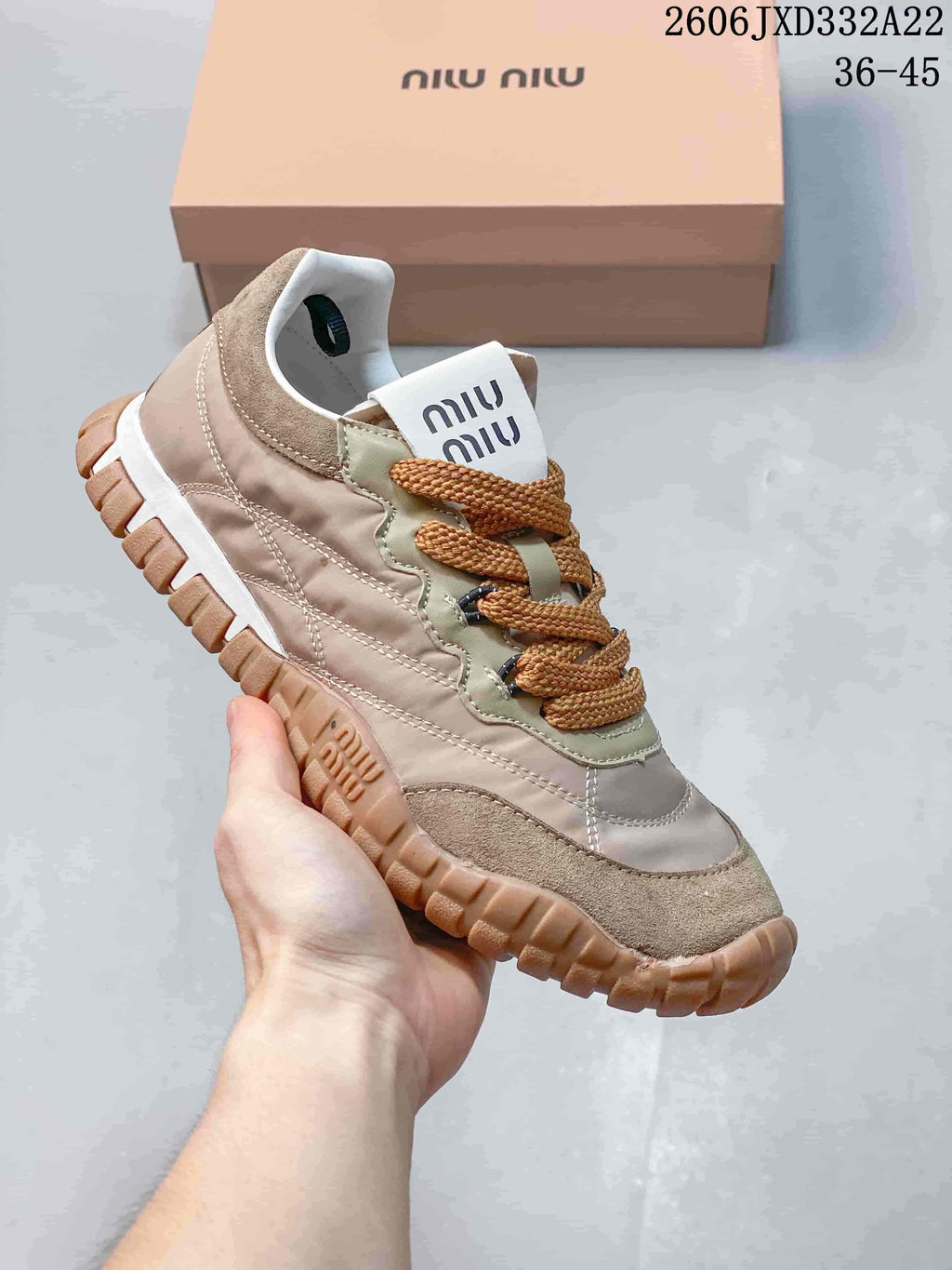 Taupe Miu Miu Tyre low-top sneaker with contrasting laces and gum-color outsole