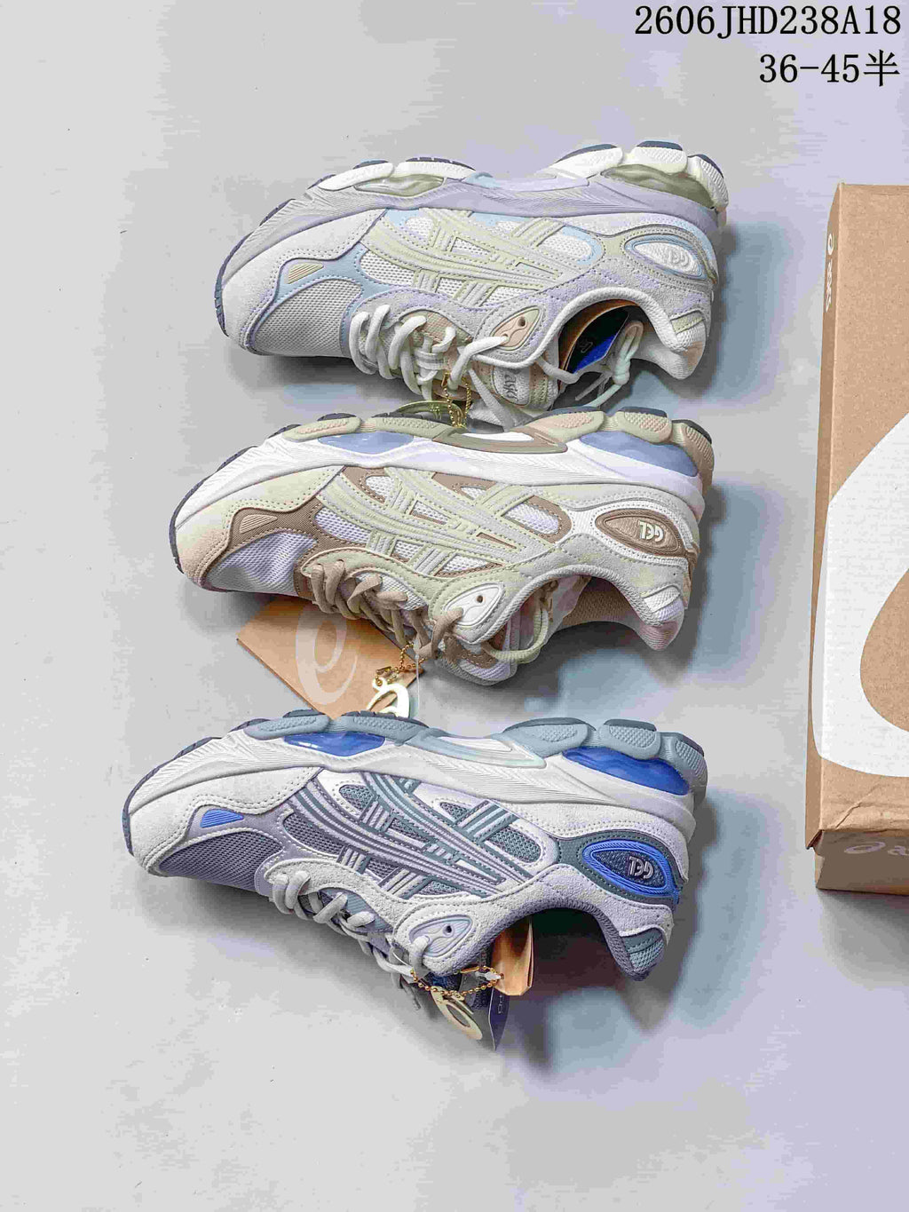 Three light-colored sneaker variations shown from the side