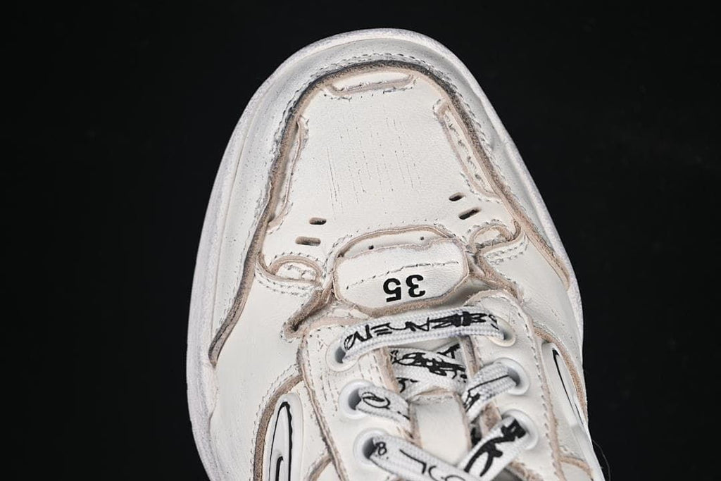 Top view showing the toe detail, graphic laces and size 35 marking