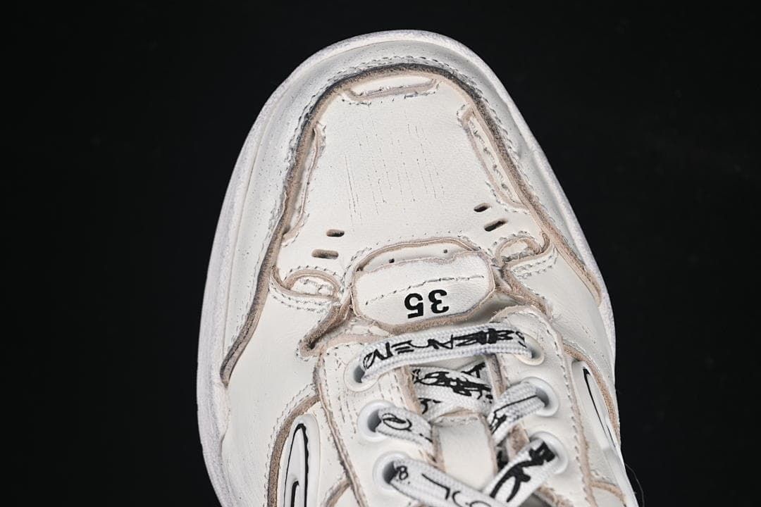 Top view showing the toe detail, graphic laces and size 35 marking