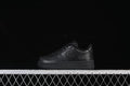Black Nike Air Force 1 '07 LE kids' low-top sneaker shown in profile