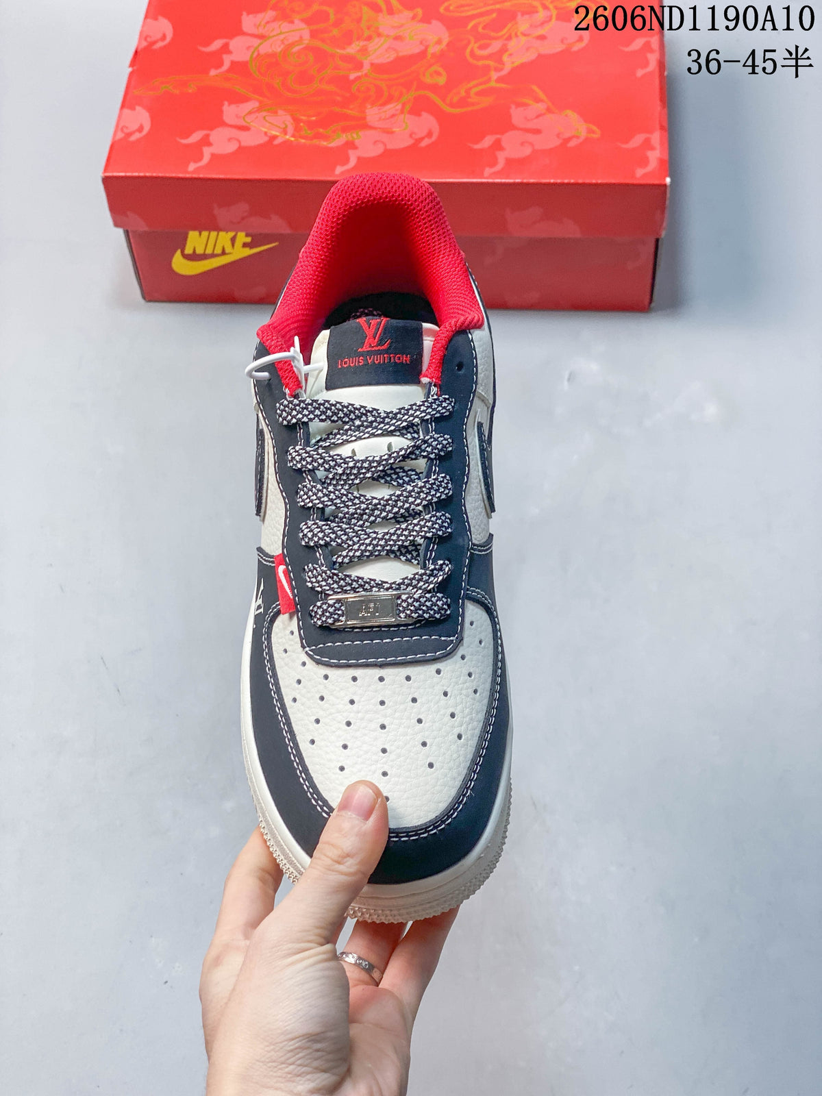 Top view showing the perforated toe, patterned laces, and red collar